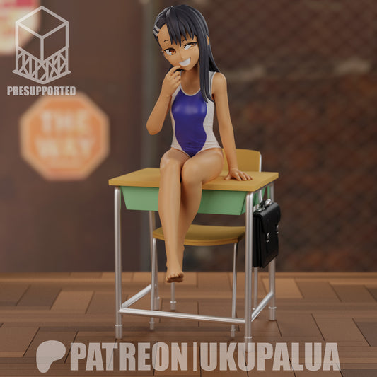 Front view of Hayase Nagatoro figurine in swimsuit with teasing smirk and one hand on her hip