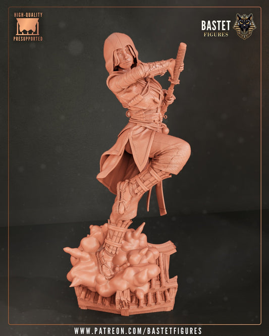 Naoe Assassin’s Creed 1:8 scale figure unpainted full pose with hood, layered assassin outfit, raised sword, and smoke-covered wooden base