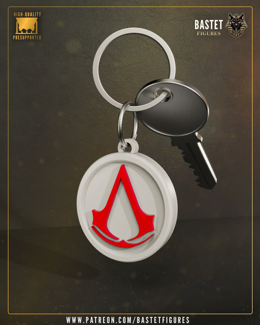 Assassin’s Creed emblem keychain with Naoe-inspired insignia attached to metal keyring and key