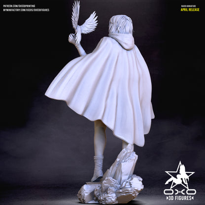 Rear view of the Raven statue showing detailed texture on the back of the cape, her hair visible over the hood, and the raised raven silhouette in flight.