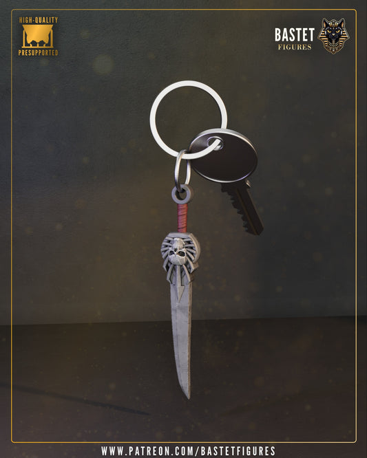 Paine Final Fantasy X sword keychain featuring her iconic oversized blade with skull pommel and wrapped handle attached to metal key ring
