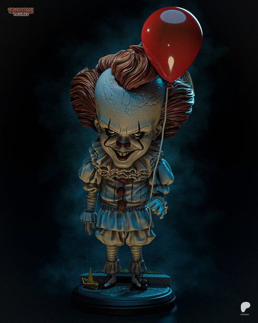 Pennywise collectible figure from IT, holding a red balloon and wearing a ruffled clown suit, standing on a base with a paper boat.