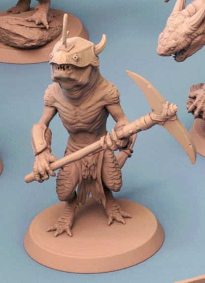 Kobold miniature standing on a base, holding a large pickaxe in both hands, wearing a horned helmet. Perfect for fantasy RPGs such as Dungeons and Dragons or Pathfinder.