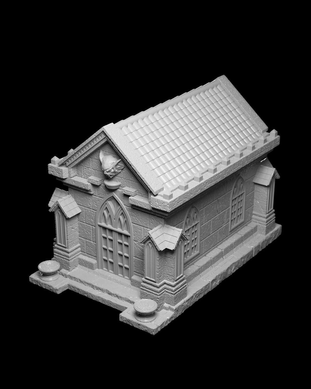 Gothic mausoleum with intricate stonework and arched doorways, suitable as scatter terrain for undead-themed adventures.