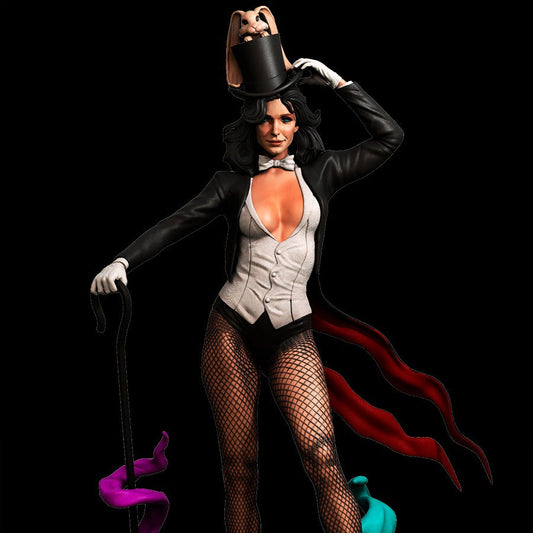 Full-color view of Zatanna figurine, featuring her magician’s outfit, hat, cane, and a dynamic pose with magical effects at her feet.