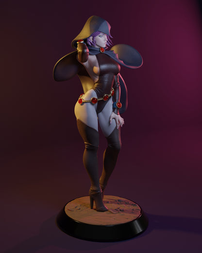 Full view of Raven figure with hooded cape, thigh-high boots, and gem belt, posed standing on rocky base.