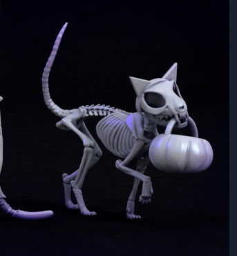 Skele Cat miniature holding a pumpkin, featuring detailed skeletal features.