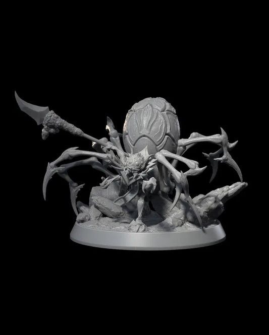 Spider Shaman miniature with a spider's body, holding spear, depicted in a mystical and threatening pose.