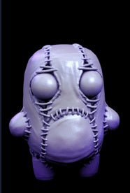 A small stitched figure with large, bulbous eyes, standing with a melancholy expression. Its stitched exterior gives it a patchwork, golem-like appearance, perfect for eerie tabletop RPG settings.