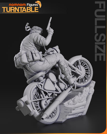 Naked Snake rear angle on motorcycle base, showing gear and holstered knife.