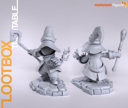 Front and back gray renders of assembled Vivi figure on rocky base, showing cloak detail, staff grip, and dynamic flame casting pose.