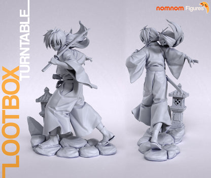 Kenshin Himura 1:10 scale figure in dynamic battōjutsu stance with sword drawn, flowing kimono, stone base, and lantern accessory; front and rear views.