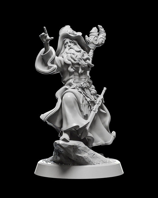 Uldor Neredras, a human male wizard miniature, standing on a rocky base. The figure is depicted casting a spell with one hand raised, holding a magical staff in the other, wearing a wide-brimmed hat and flowing robes.