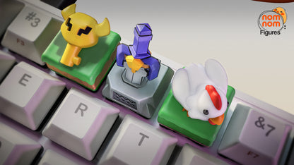 closeup of zelda link to the past artisan keycaps showing big key keycap master sword pedestal keycap and cucco chicken keycap on mechanical keyboard