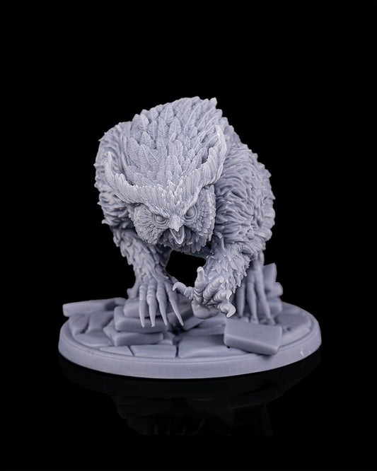 Owlbear miniature front view from Beldrad's Bag of Beasts with hooked beak, feathered head, massive claws, and hunched predatory stance on a stone base, avian ogre monstrosity for Dungeons & Dragons