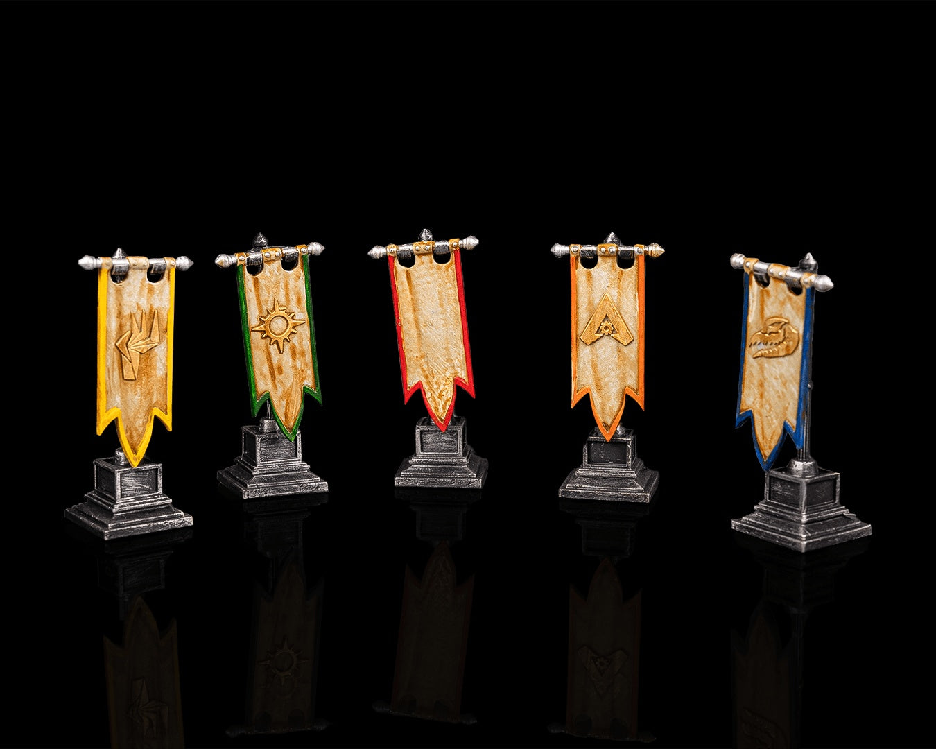 Fantasy banner stands with heraldic symbols on stone bases used as scatter terrain for medieval and high fantasy tabletop settings
