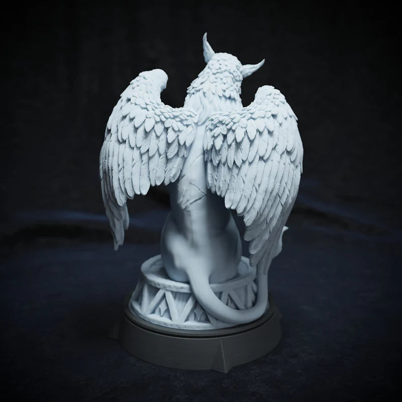 Back view of griffin figurine with detailed wing feathers and curled tail.