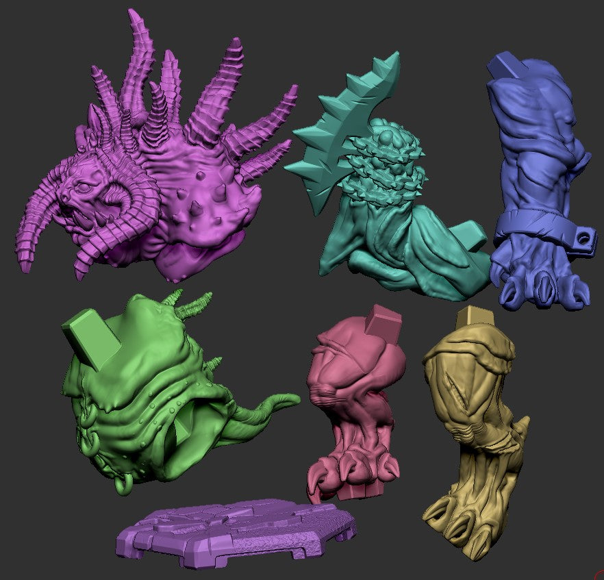 Colorful demon miniature parts for tabletop RPGs and wargames, including tentacles, claws, and armor pieces in purple, green, blue, and yellow.