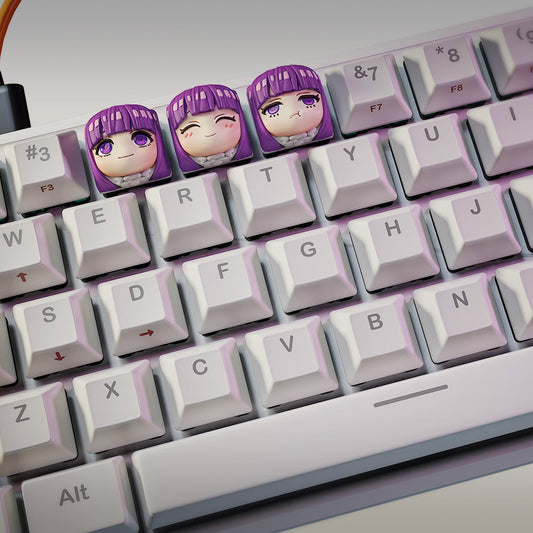Fern Frieren Beyond Journey’s End artisan keycaps mounted on mechanical keyboard showing three chibi facial expressions