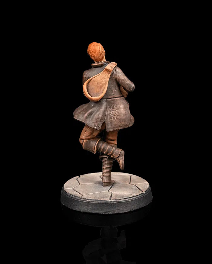 Human bard hero miniature rear view from Beldrad's Bag of Beasts showing flowing coat, shoulder-slung instrument bag, casual stride, and wandering minstrel posture for tabletop roleplaying games