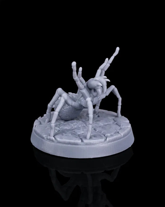 Giant spider miniature front view from Beldrad's Bag of Beasts showing fanged head, extended legs, wide ambush stance, and rocky base, huntsman spider beast for tabletop roleplaying games