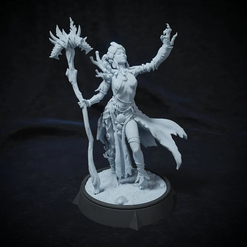 Aria, Maiden of the Coral, a female kahuna miniature, stands poised with a coral-adorned staff, casting a spell with her outstretched hand. Her attire features oceanic charms and flowing garments, capturing her mystical connection to the sea. Perfect for D&D or Pathfinder campaigns with a coastal or aquatic theme.