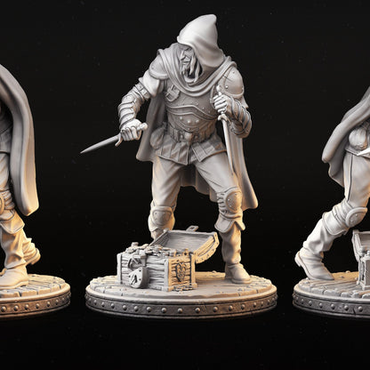 Male thief Balthazar Wade in a hooded cloak holding a dagger, standing beside an open treasure chest.