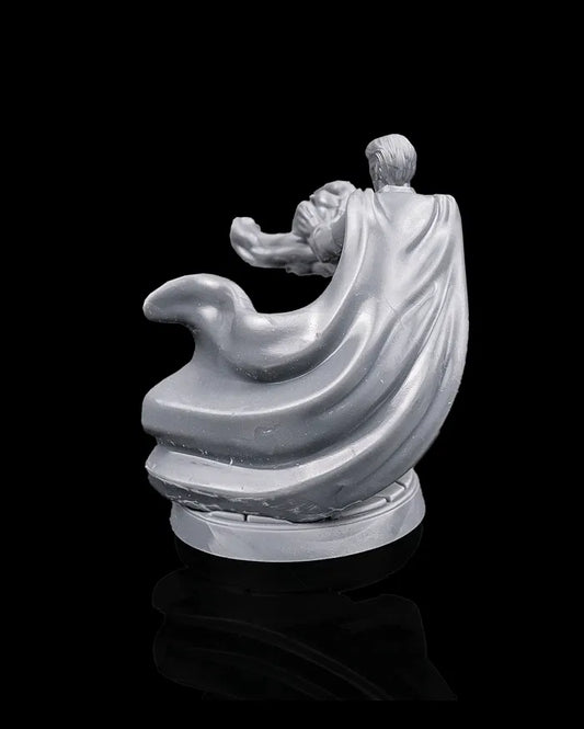 Human sorcerer hero miniature rear view from Beldrad's Bag of Beasts showing sweeping cloak, forward momentum pose, layered garments, and cinematic spellcasting posture for tabletop roleplaying games