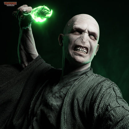 Lord Voldemort statue close up snarling portrait holding glowing magic dagger, bald dark wizard Harry Potter collectible figure