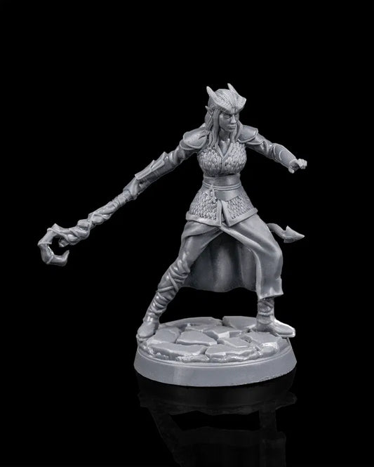 Tiefling druid hero miniature front view from Beldrad's Bag of Beasts with dynamic stance, flowing clothing, horned silhouette, and feral druidic posture inspired by Dungeons & Dragons Honor Among Thieves