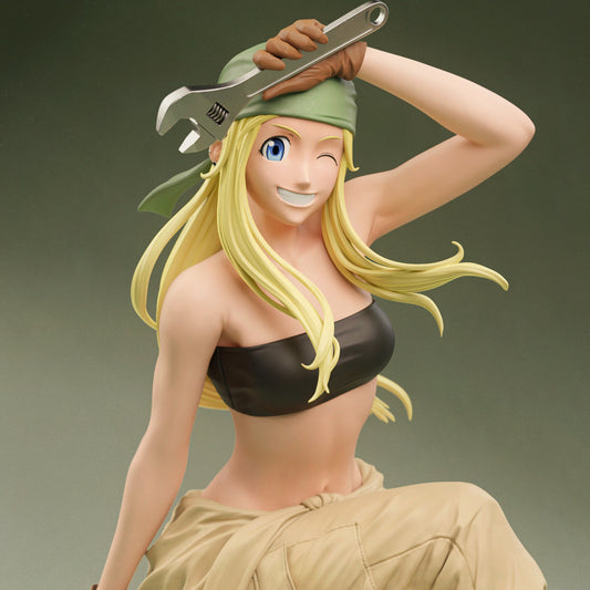 Close-up of Winry Rockbell anime figurine with blonde hair, black top, and bandana – Fullmetal Alchemist statue