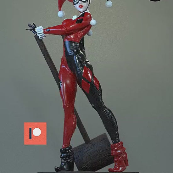 Close-up view of painted Harley Quinn from the side, showing detailed mask and glossy red and black outfit.
