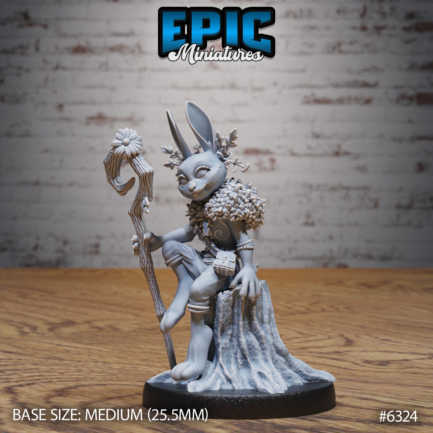 rabbit folk druid resin miniature harengon seated on tree stump with wooden staff dungeons and dragons tabletop character