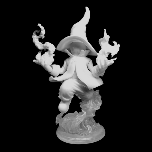 Close-up of Vivi collectible figure showing wide-brimmed hat, detailed robes, and flame effects swirling around base.