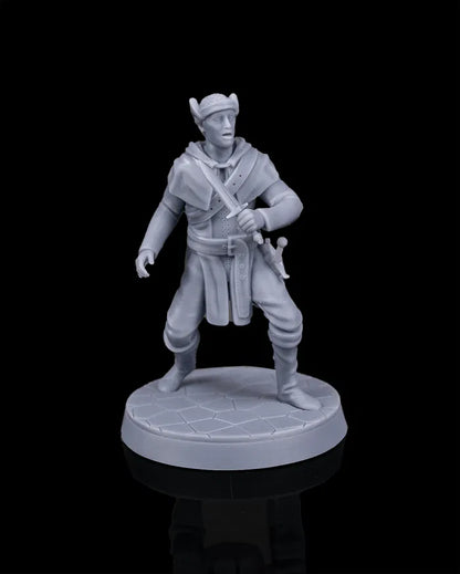 Slugs human rogue NPC miniature standing alert with short sword drawn, light armor and hooded cloak, fantasy tabletop character from Beldrad’s Bag of Beasts collection