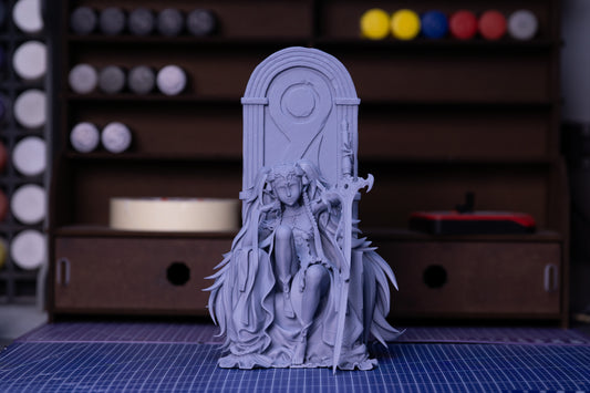 Sothis Fire Emblem unpainted seated figure shown on workbench with throne base flowing hair and staff