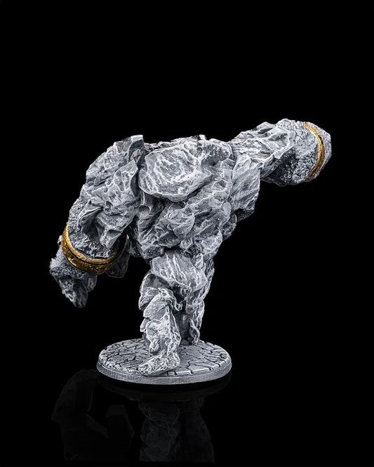 Stone golem miniature rear view from Beldrad's Bag of Beasts with jagged rock body, heavy stone limbs, engraved bands, and imposing construct stance on a stone base for Dungeons & Dragons encounters