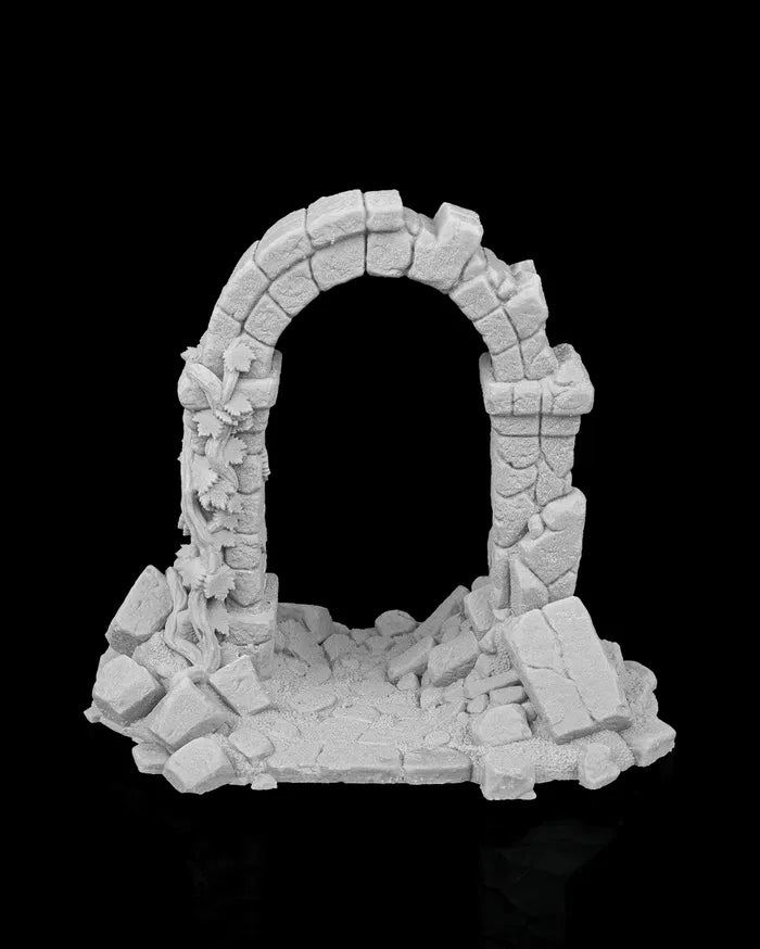 Ruined stone arch structure with collapsed sides and scattered masonry