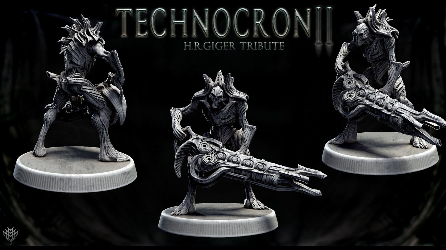 Biomechanical Technomech Fighter posed with a large alien weapon, sculpted with organic and mechanical details.