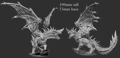 Undead Blue Dragon skeletal dracolich miniature with decayed wings and bone-plated body posed on rocky terrain.