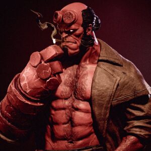 Close-up of Hellboy by CA3D featuring his filed-down horns, glowing eyes, cigar, massive Right Hand of Doom, and detailed muscular sculpt.