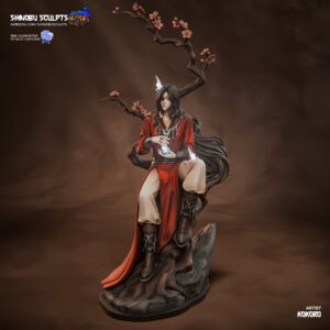 Computer-generated color render of Hua Cheng from Heaven Official's Blessing by Shinobu Sculpts, wearing deep red robes with long dark hair while seated beneath a flowering tree on a textured rocky display base.